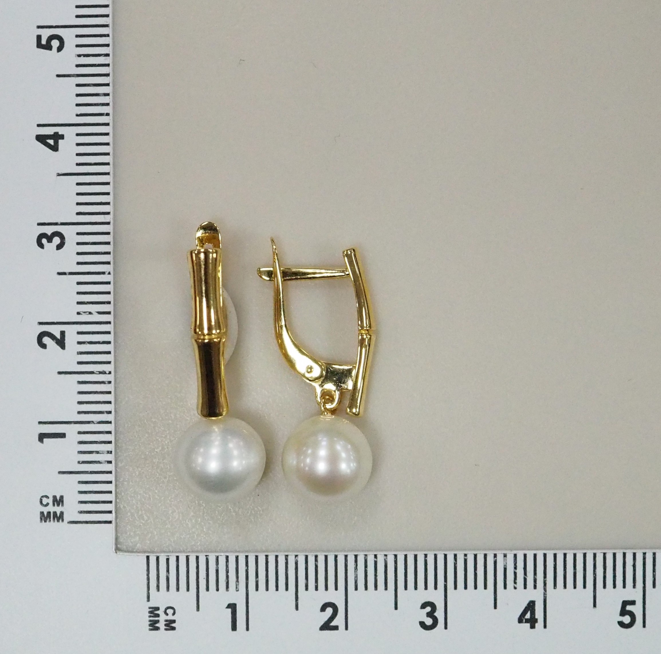 Серьги из желтого золота с жемчугом